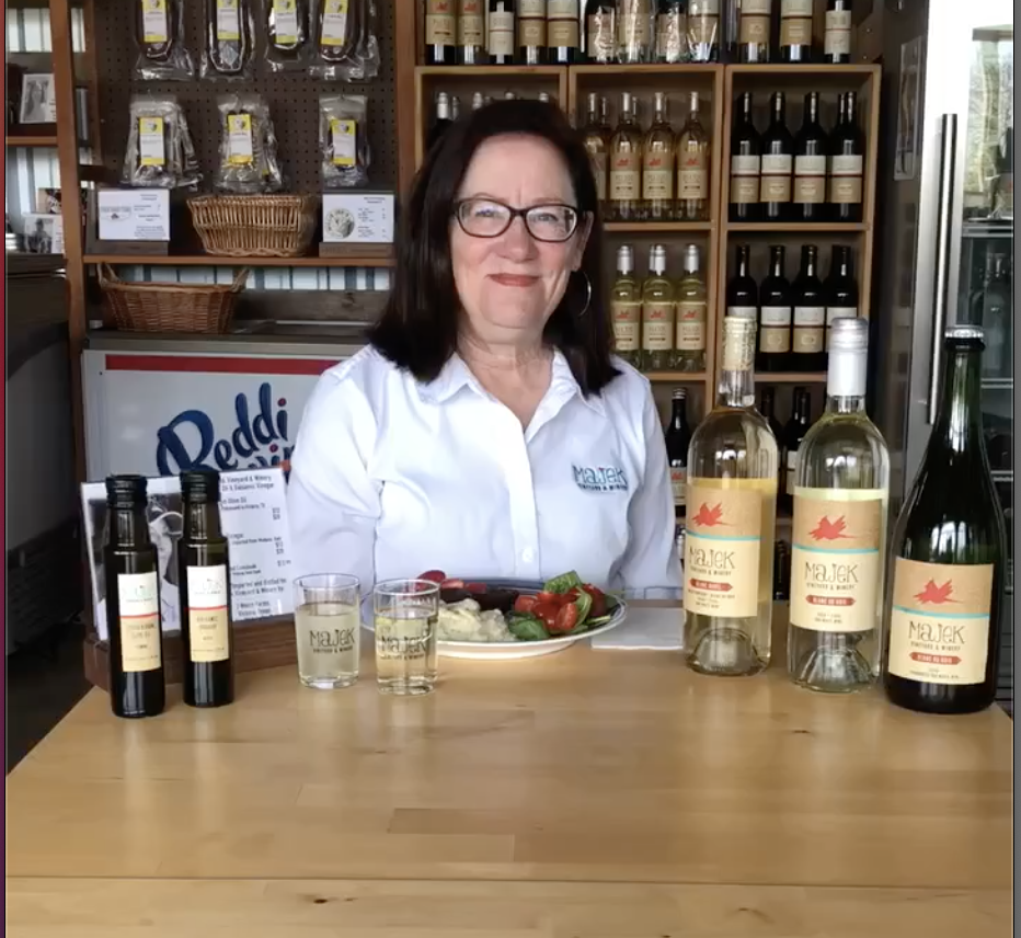 Lynne inside Majek Tasting room